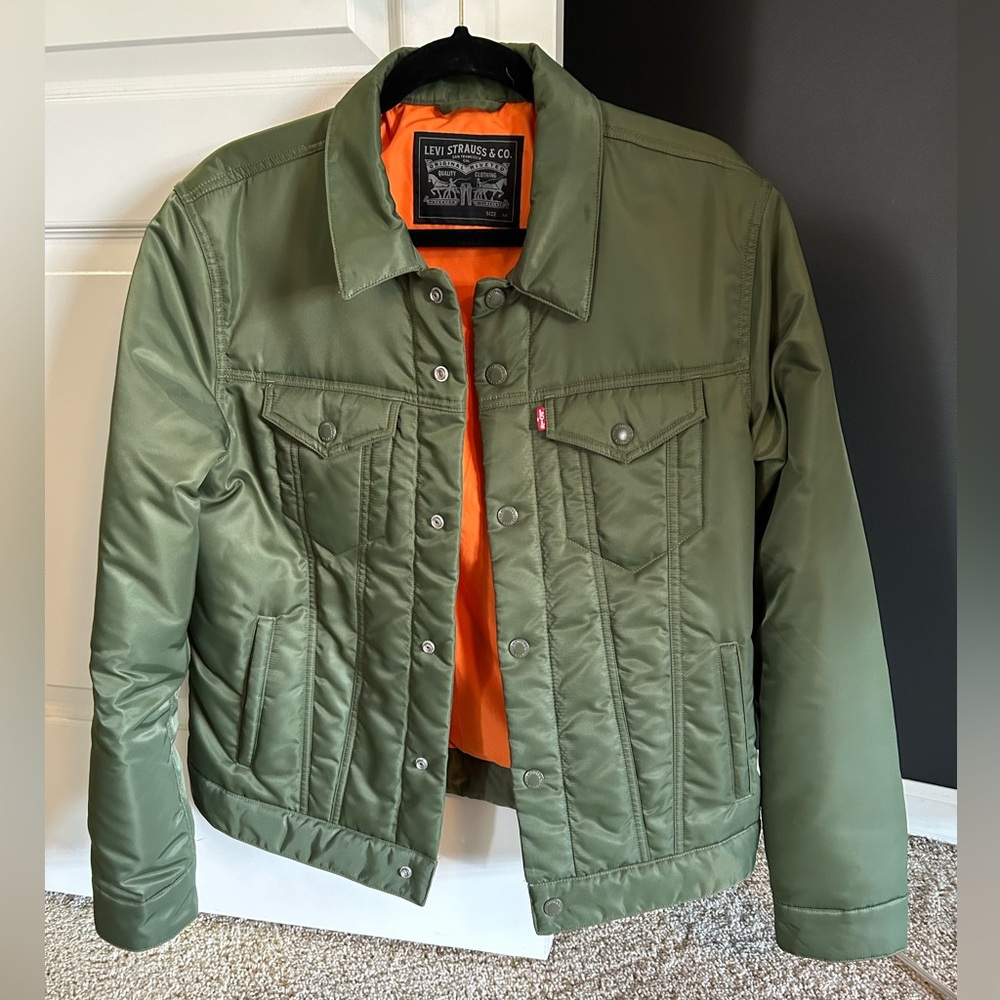 Forest green, Levi’s quilted type-iii trucker jacket, blaze orange interior.